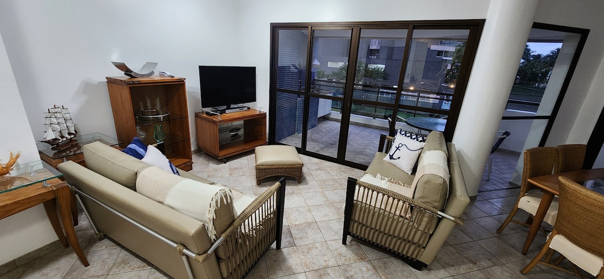 Successful Airbnb property: Beautiful apartment, right on the sand, with a barbecue grill in Bertioga