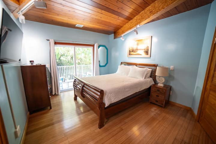 Wake up refreshed and enjoy a cup of coffee on the private attached balcony. 