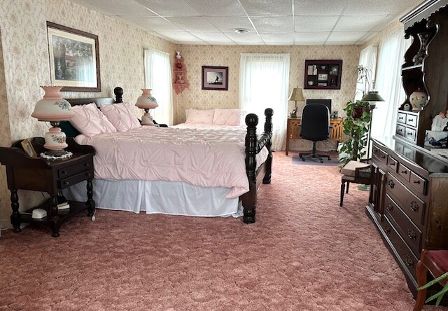 ห้องนอนพร้อมเตียงควีนไซส์ 2 หลัง
ฟูกนอนเดี่ยวใต้เตียง