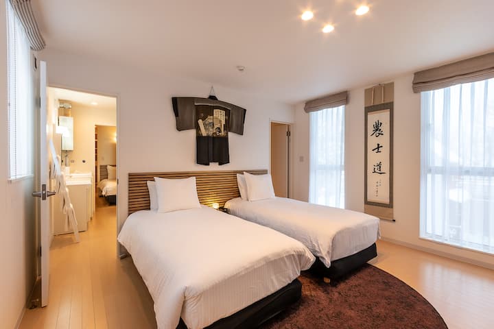 Bedrooms 2A & 2B offer separately zoned sleeping areas for a total of 4 persons (2 persons per sleeping zone).  There is a large family-size bathroom zone with separate toilet, shower/bathroom and vanity basin. There is also a separate laundry room.