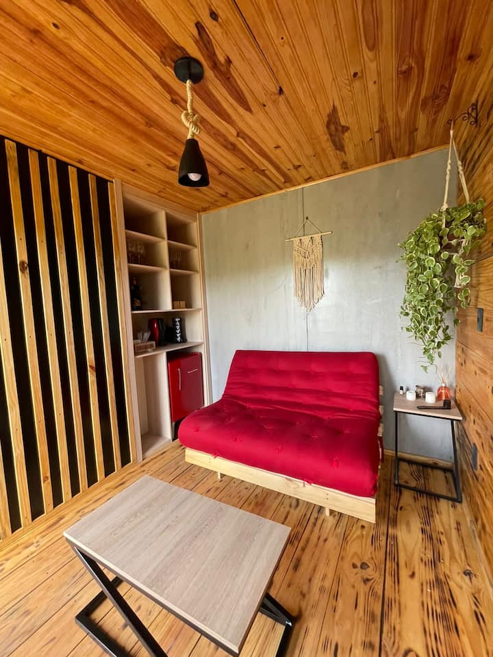 living room, equipped with kitchen utensils, suitable for snacks and quick meals.