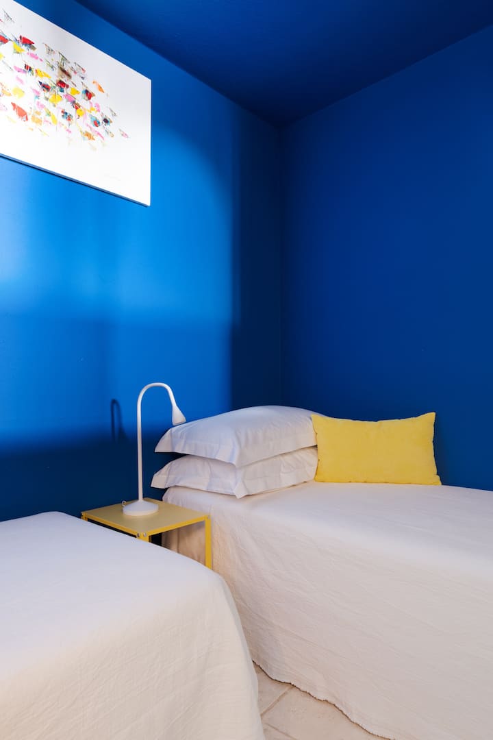 The petite size, combined with the calming blue walls, creates a wonderfully cozy atmosphere.
