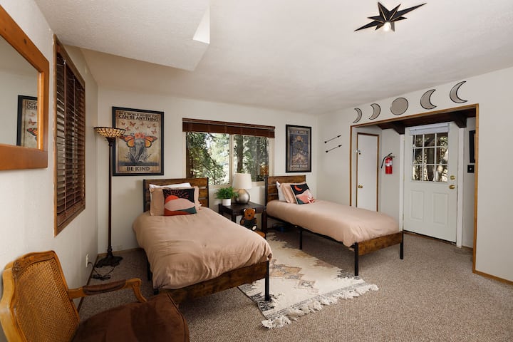 This bedroom is downstairs with its own Full bathroom.  The rest of the living area is upstairs with it's own bathroom.