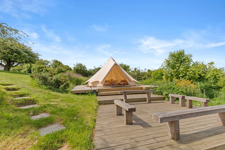 Luxury bell tent available Spring and Summer, sleeping up to 6 people.