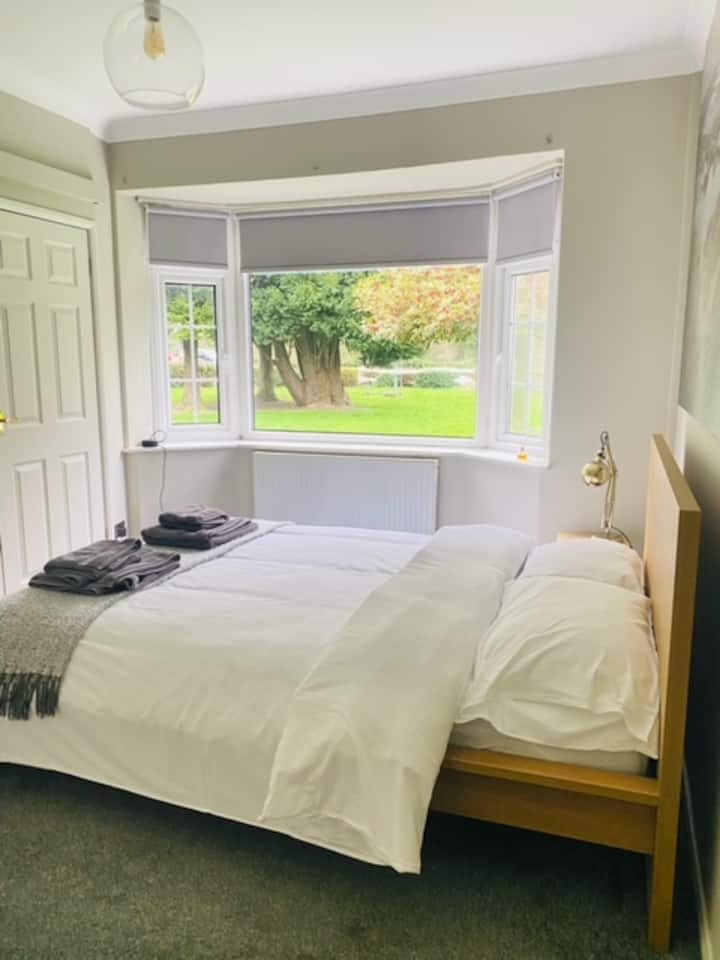 Second double bedroom — bright, airy and restful