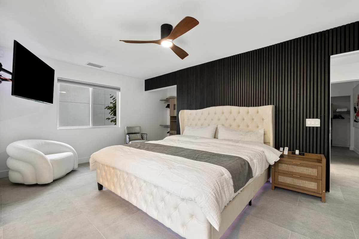 Guest bedroom with slatted feature wall