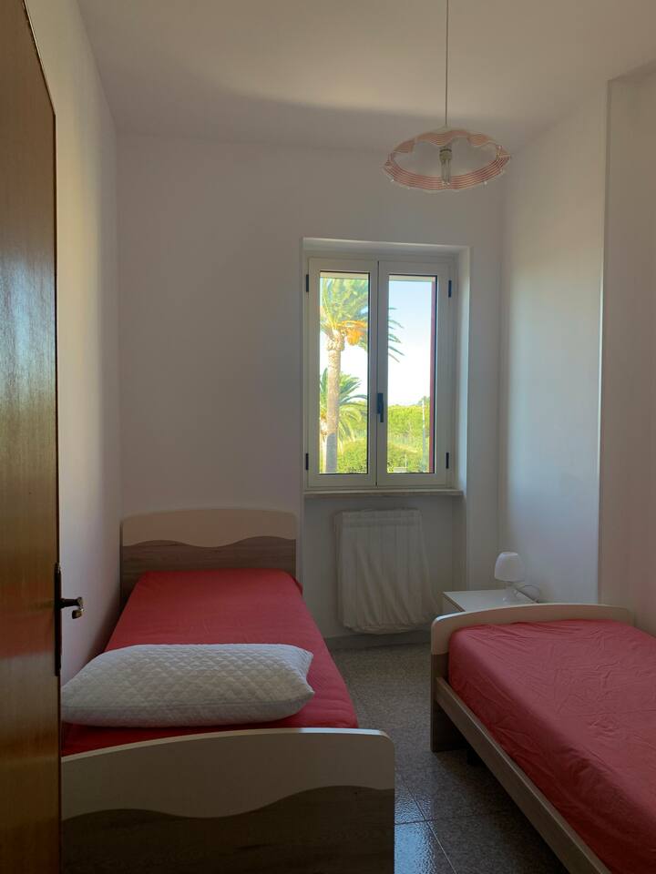 Schlafzimmer 1 mit zwei Einzelbetten