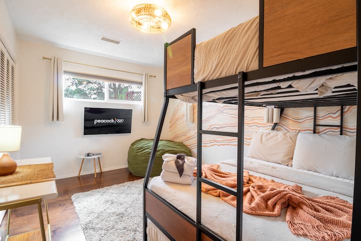 Guest room includes a full/twin bunk bed and a twin trundle with premium, 100% cotton sheets. Smart TV with Disney+ and Hulu, plus retro Playstation with 10+ games. Super comfortable memory foam bag chair. 