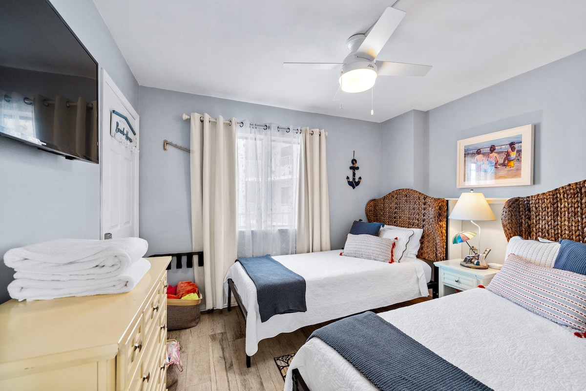 XL Twin beds same length as a queen size bed.  Plenty of room under the beds for storing suitcases. Smart tv, ceiling fan and full size chest of drawers, basket of extra throw blankets