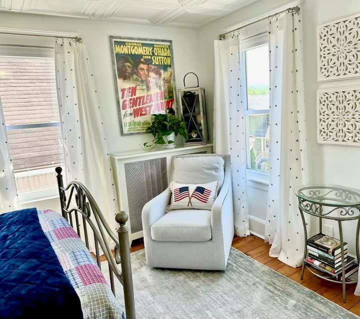 The three bedrooms have a place to sit in addition to the bed.