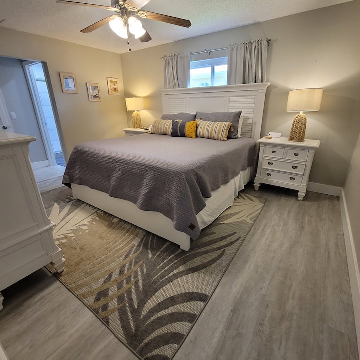 Primary room with medium soft King sized bed. 