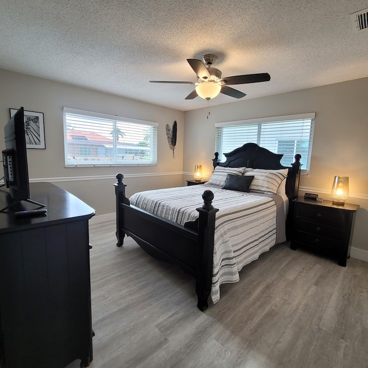 Canal facing guest room. Room has a soft queen mattress. 