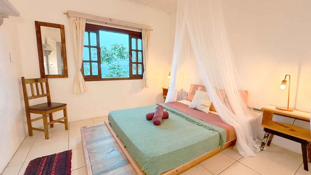 ห้องพักพร้อมเตียงคู่และวิวหุบเขา