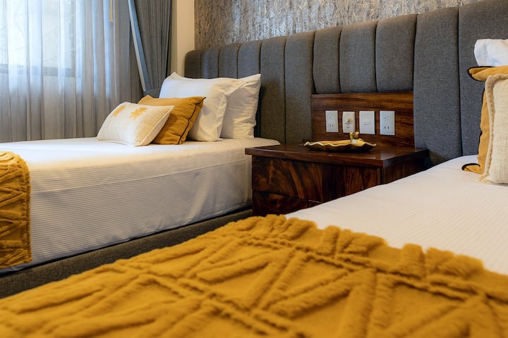 Beach, dine, and unwind! 2BR condo steps from Nuevo Vallarta's sands. Walk to eateries and Oxxo. Golf nearby. Car included for adventures. Ideal for 5 seeking a perfect Mexican escape.