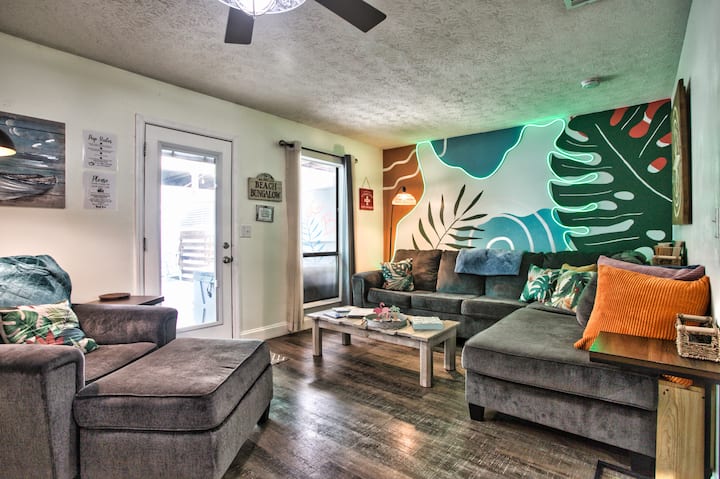Cozy living room with a queen pull-out couch and cool lighting. Ready for a night in or a place to relax in the winter for our snowbirds! 