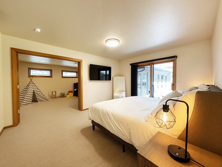 Master Bedroom(king) + Den(twin trundle beds). French doors allows for separation and privacy for families.