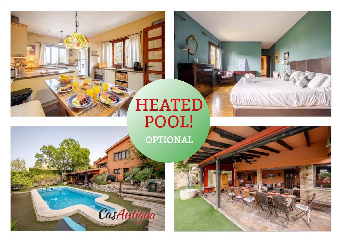 A spacious kitchen is shown, featuring modern appliances and a dining table set for breakfast. A comfortable living area with a large bed is visible, alongside an outdoor space with a heated pool option. The patio area offers a large dining table for gatherings.
