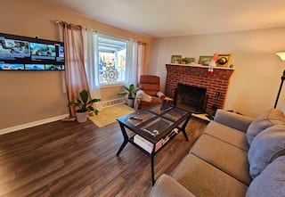 Peaceful Brick Home •Long & Short Stays + Parking, photo 1 of 38