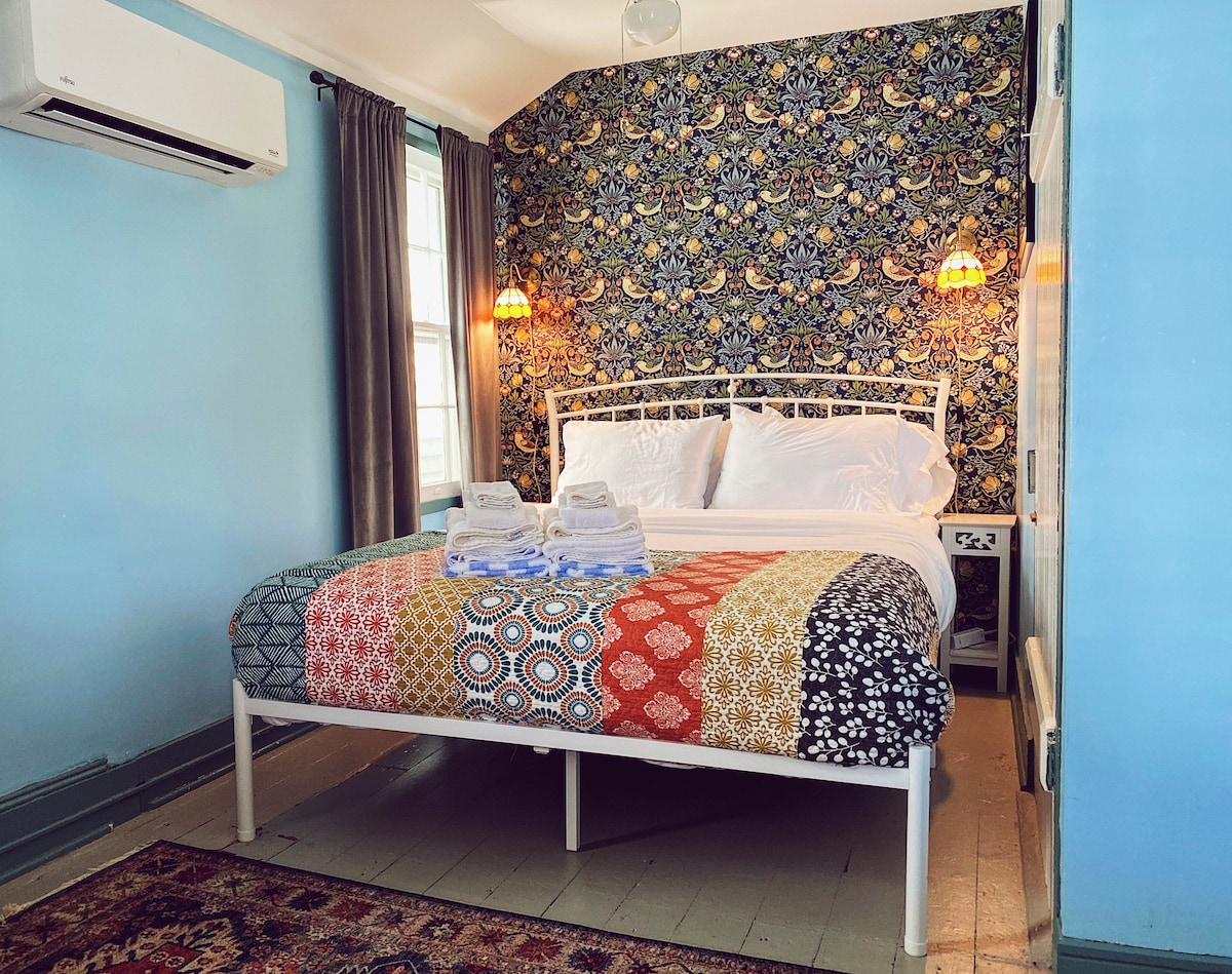 Queen bedroom opens directly onto the sunny upstairs porch