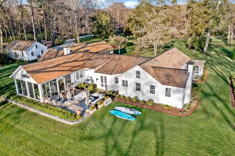 Relax & Rejuvenate in this 1920s Riverfront Estate