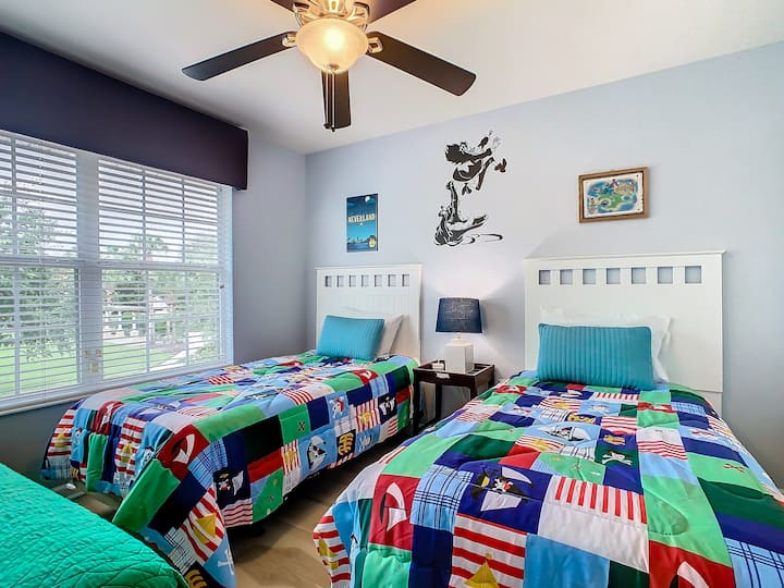 This second floor twin bedroom offers three twin beds and a Roku TV. A full private bathroom is located right across the hall. The perfect place for teens and tweens!