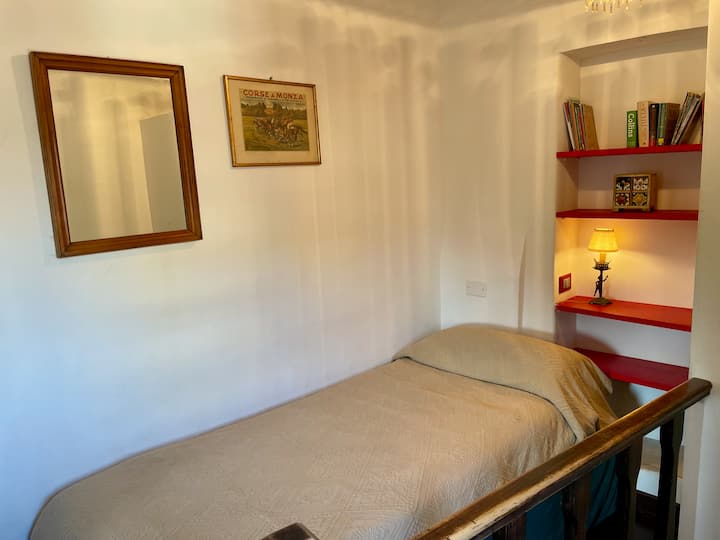 The upstairs bedroom nook is quiet and has its own unique view of the rooftops of Trastevere.