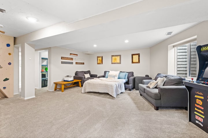 Basement living room with queen pullout couch bed. We recommend this bed for Teens or kids!