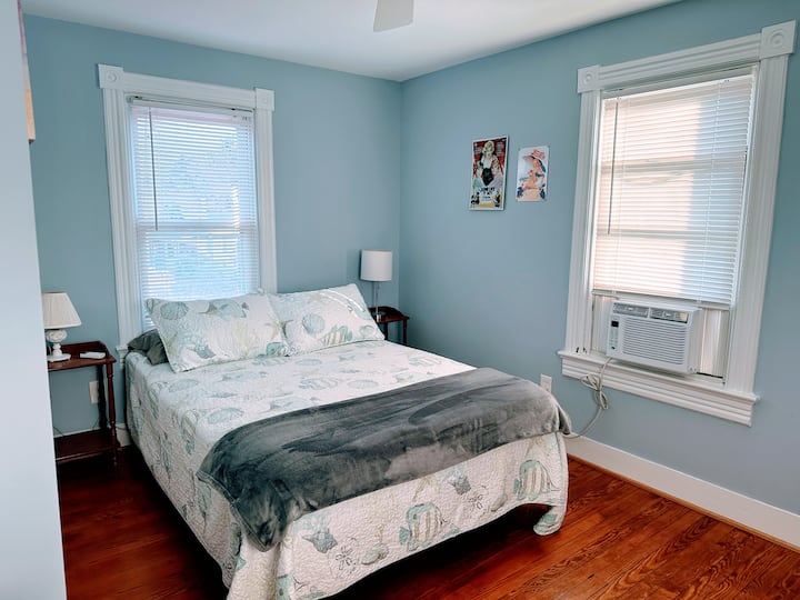 Top of the stairs, straight back is the 4th bedroom with a full bed.  And if you prefer, this room can host the pack and play <grin> And, the window behind the pillows - looks straight out to the water.