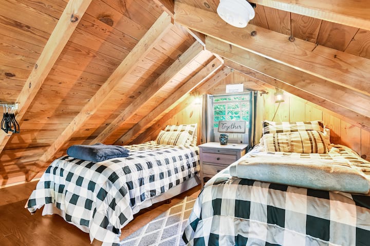 Upstairs Loft open to living room. The ceiling is low up here. Perfect for kids or adults (just watch your head!) 