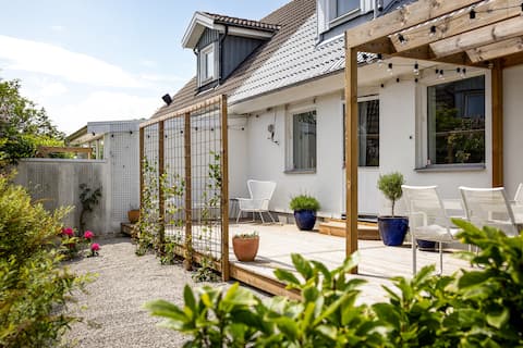 Cozy house near beach meadows, cliffs and sea