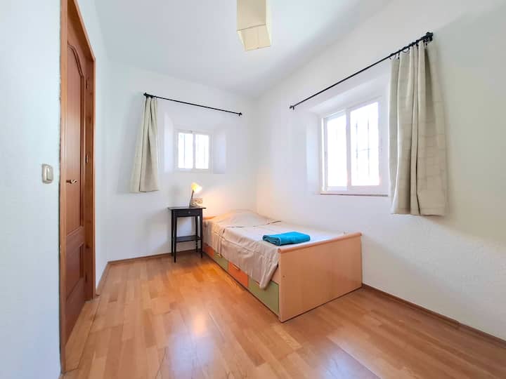 Bedroom 2 on the second floor floor with a single bed, bedside table and wardrobe