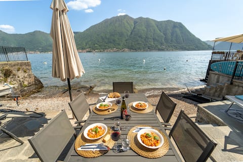 Lake view house with private beach and garage