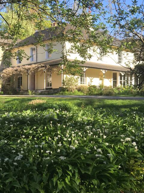 Rambling Regency family home set in lovely gardens
