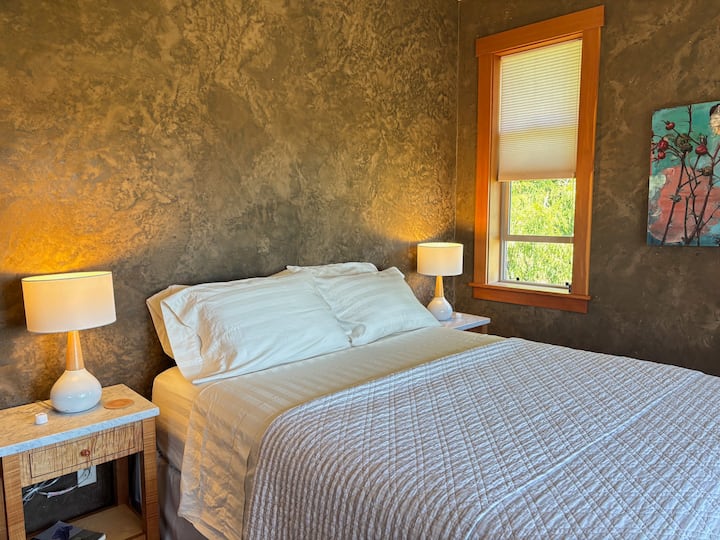 Bedroom on second floor, hotel-grade cotton linens, natural plaster walls