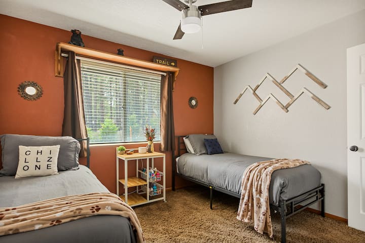 Two single beds featured in the third bedroom.