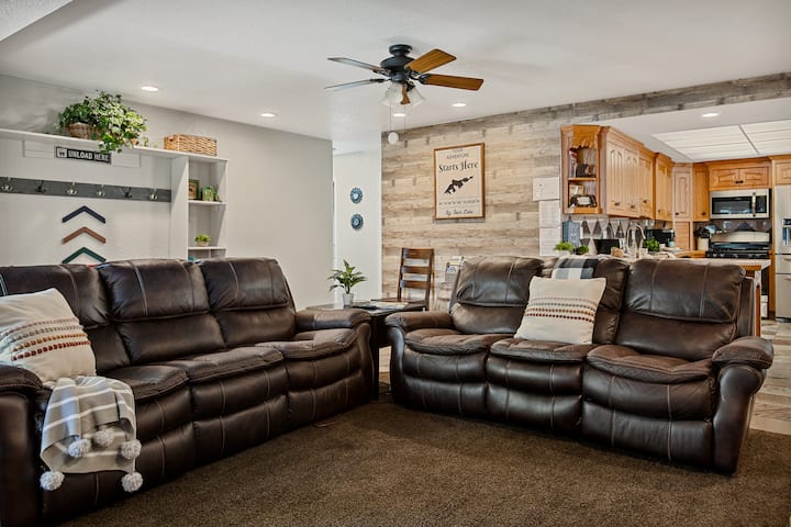 Sink into one of our cozy leather sofas in the living room area.