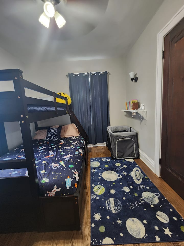 Full bed lower with a  twin bunk up.
Kids love this room! Childrens books , portable baby monitor,  and Pack & Play crib with sun shade and.changing deck ability.