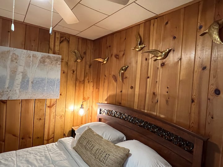 Queen size bed; 43" smart tv available in the armoire; luggage rack.  Washer/dryer are in the closet of this bedroom.