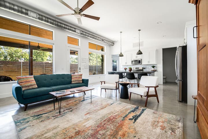 Large open concept living room and kitchen with the large outdoor porch area.  Indoor/Outdoor living spaces.