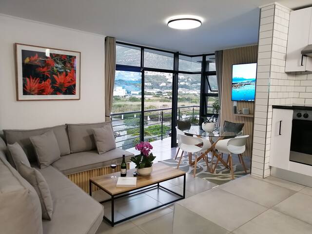 Own Apartment on the beach, magical mountain views