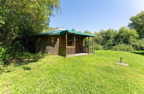 Successful Airbnb property: Wooden luxury camping bungalow, in the dunes in Sint Maartensvlotbrug