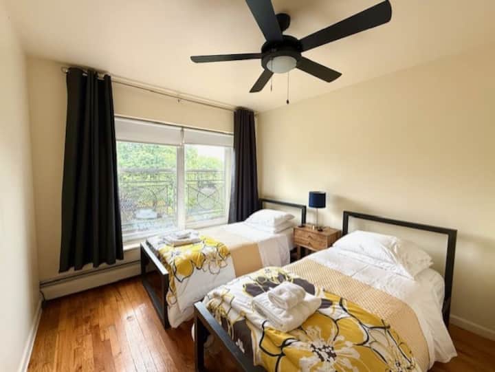 Two Twin Beds In A Serene Townhouse Bedroom - New York City