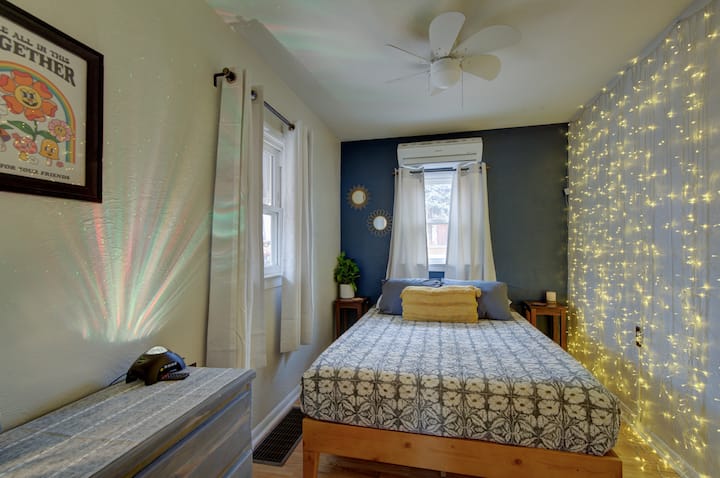 Immerse yourself in our intimate and snug bedroom, meticulously crafted with your ultimate comfort in mind. Adorned with delicate hanging wall lights, the room emanates a soft, ambient glow, elevating the atmosphere for a truly serene experience.
