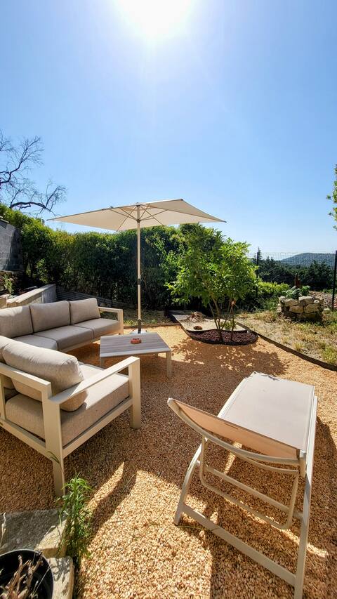 House in the heart of a village, view of the mountains
