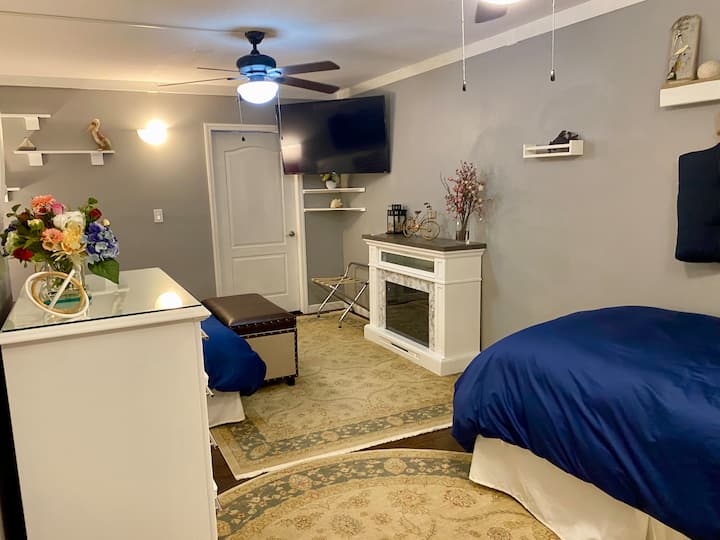 The Chesapeake. 
Sleeps three. Family bedroom with king and twin bed and en-suite fireplace. Large enough to easily also fit a pack and play.