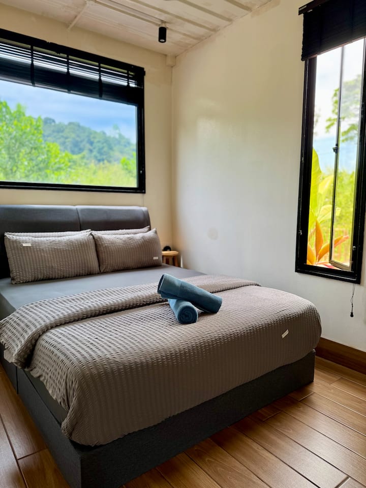 Second Bedroom is located on ground floor comes with a queen sized bed able to accommodate 2 pax (No mattress can be added)