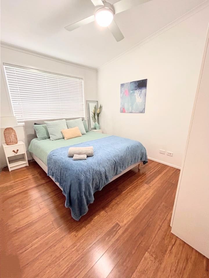 New Queen Bed with a memory foam mattress designed to contour your body and promote sleep. Spare Cupboard to hang clothing. An Ironing board, iron , Portacot and extra linen are available in this room. 