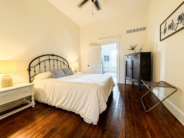 Bedroom located off of the hallway. Queen bed with no windows so its perfect for those mid day naps! Has a dresser for clothing. 