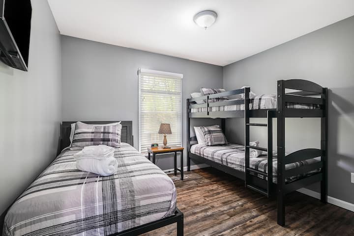 Twin bed and Twin bunk beds with 32" Smart TV