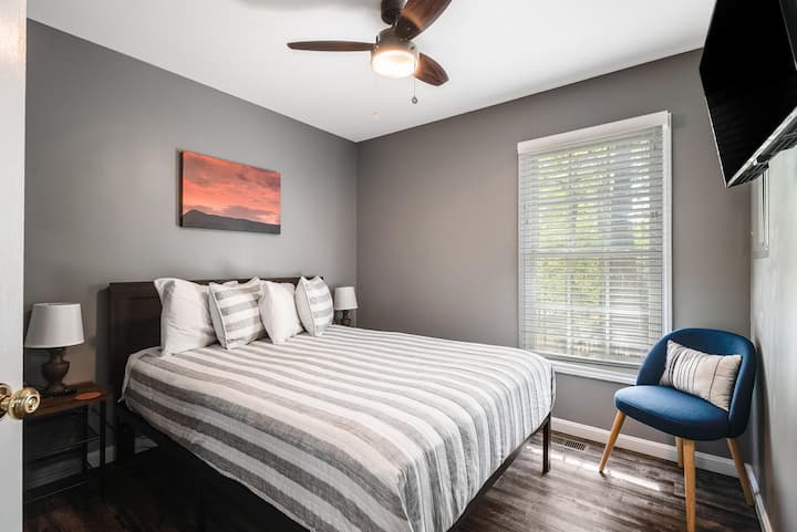 Queen bed with 42" Smart TV